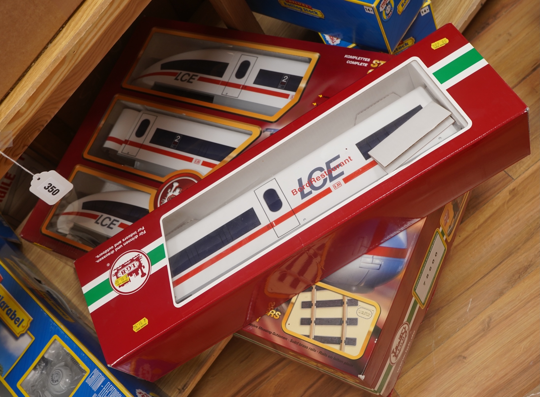 Three boxed Bachmann G gauge (45mm gauge) Thomas the Tank Engine items; Percy the Small Engine (91402), a Cargo Car (98006) and a Troublesome Truck (98001). Condition - good.